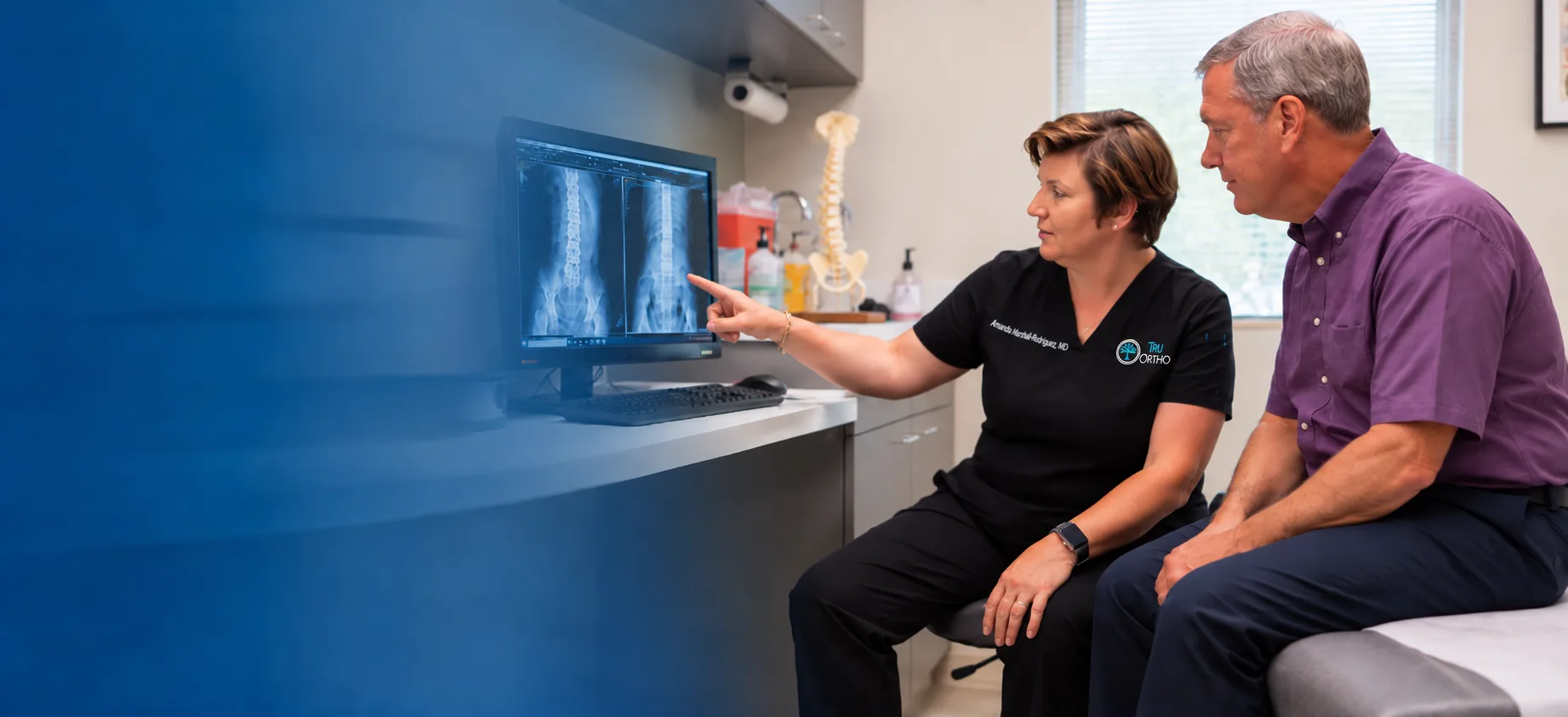 Dr. Amanda Marshall-Rodriguez reviewing imaging with a patient at TruOrtho.